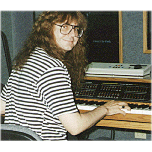 Christopher Currell with his Synclavier® Digital Audio System, late 1980s